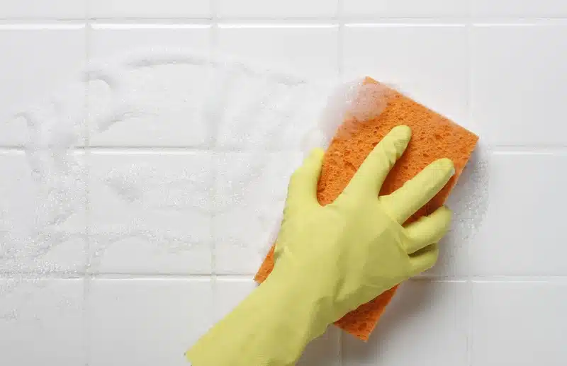 cleaning bathroom tiles to remove moisture buildup in San Francisco home